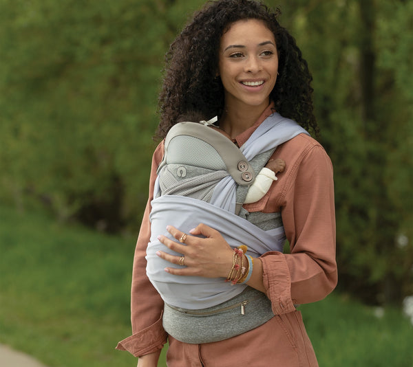 Mom wearing the pearl Boppy ComfyChic Baby Carrier