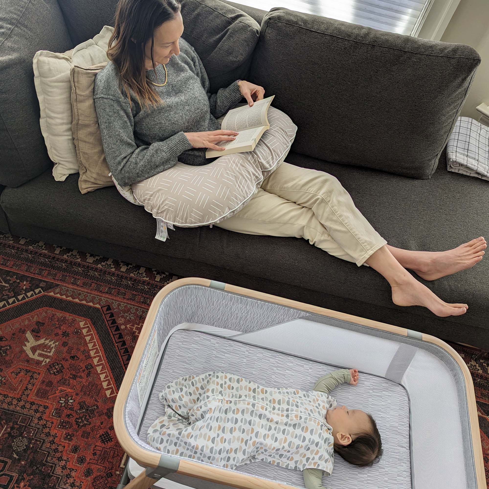 baby sleeping in bassinet